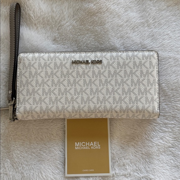 Michael Kors Handbags - Michael Kors White and Silver Wristlet